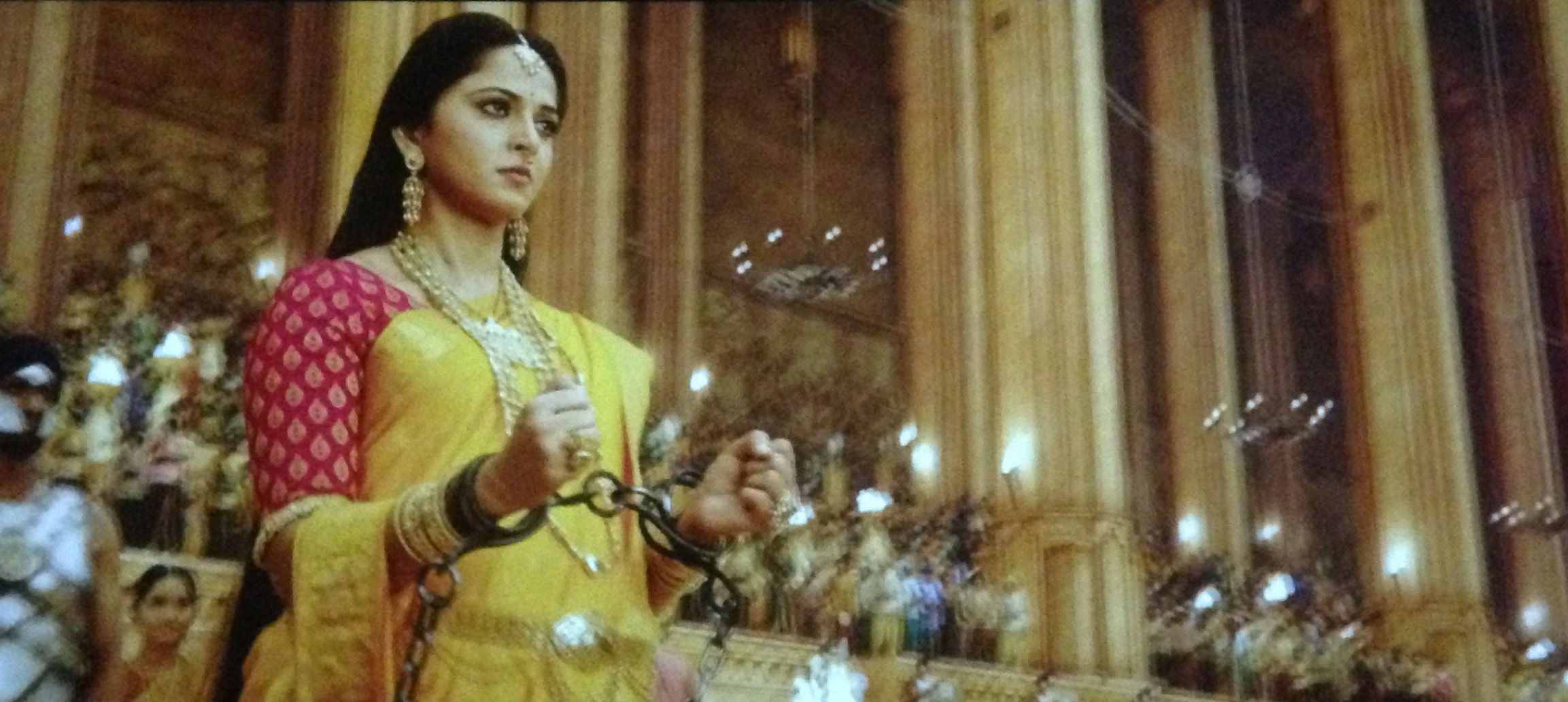 Anushka Shetty yellow saree in bahubali 2 The conclusion, Anushka Shetty handcuffed scene in bahubali 2 